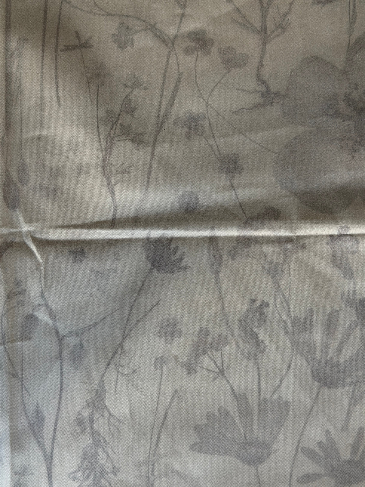 Floral pattern with light gray flowers on a white background