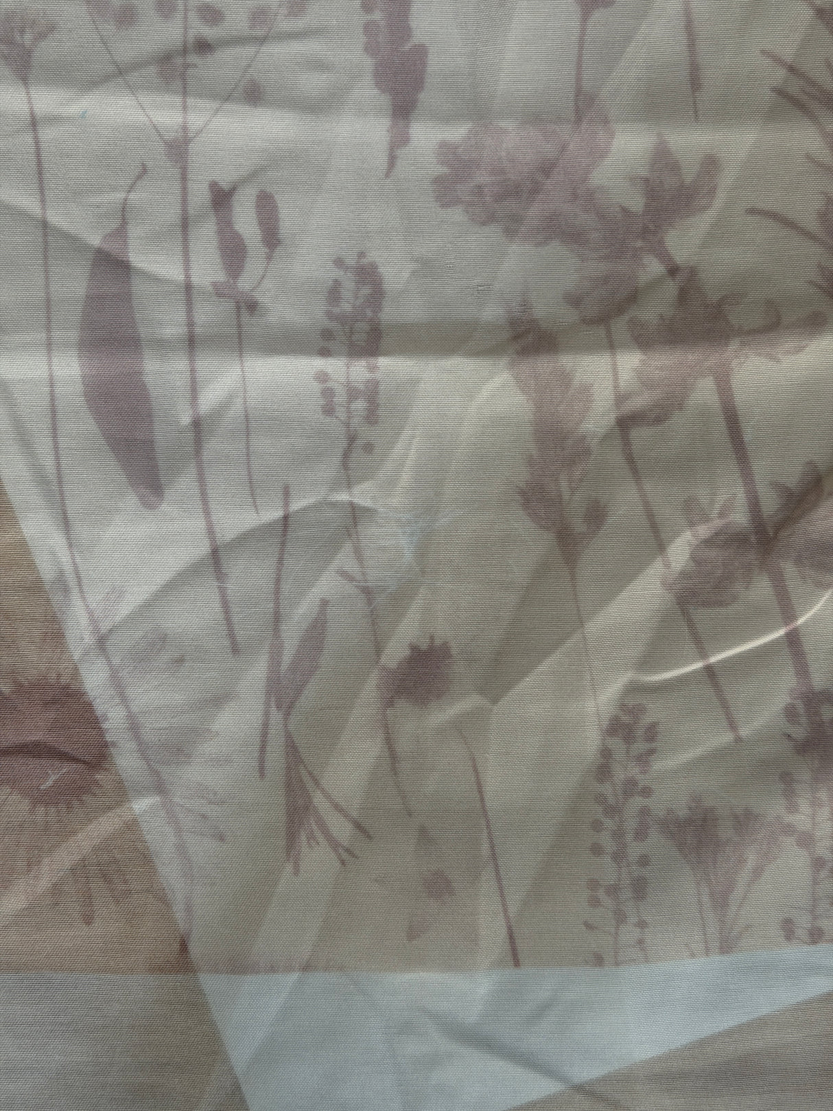 Textured fabric with a subtle pattern on a neutral background