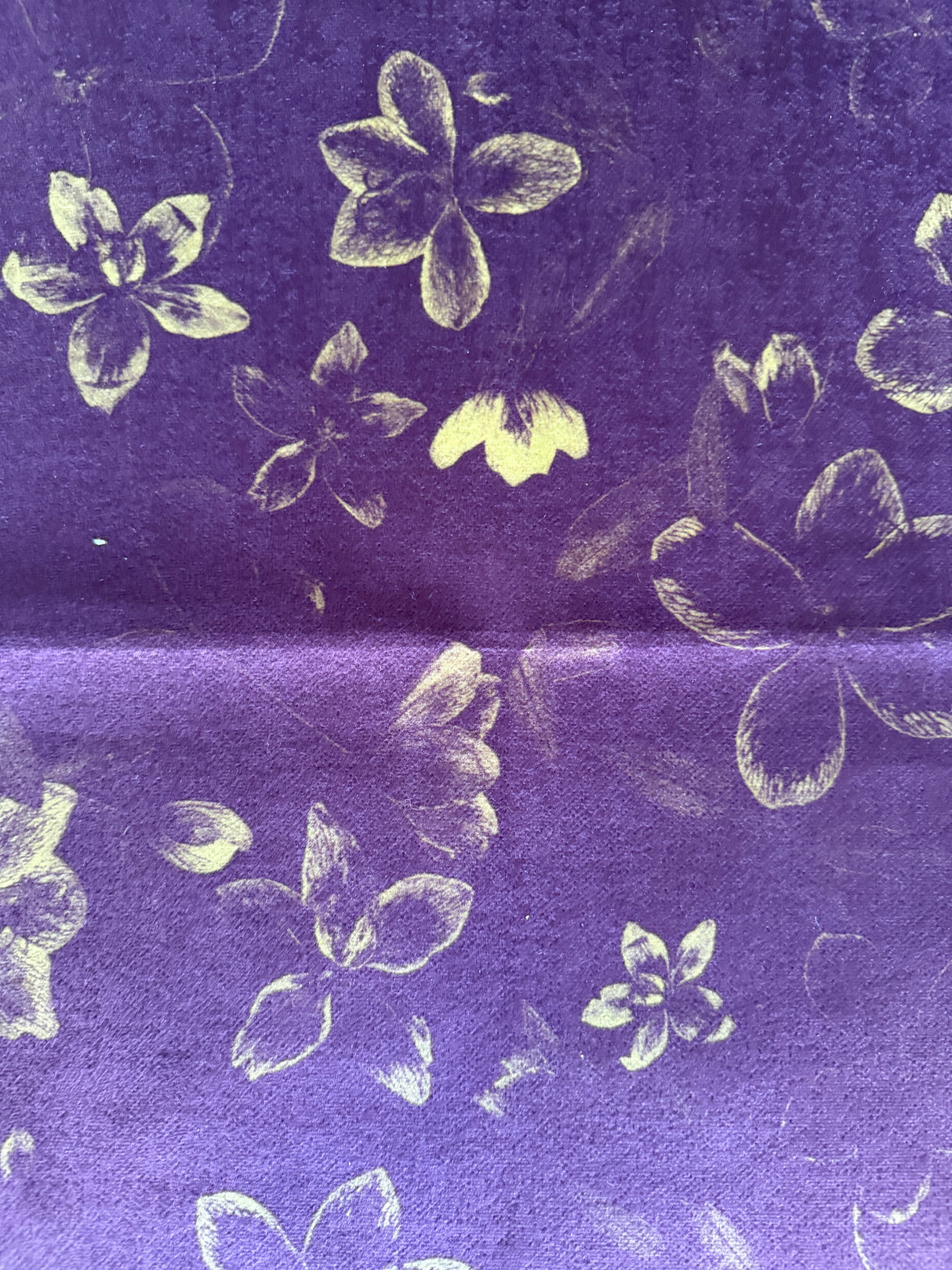 Floral pattern on a textured merlot fabric