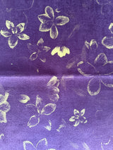 Floral pattern on a textured merlot fabric