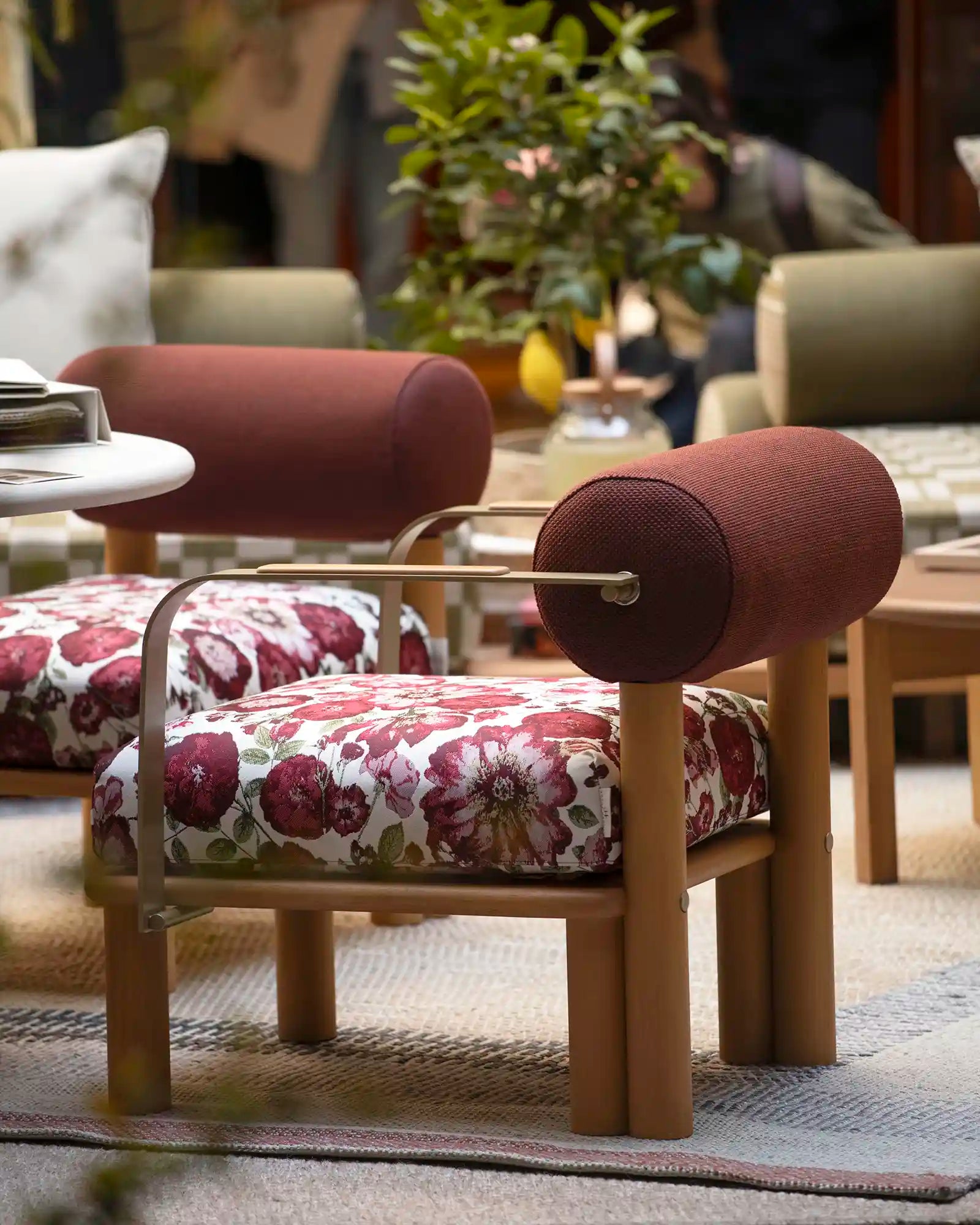 Decorative chair with floral cushion in a room setting